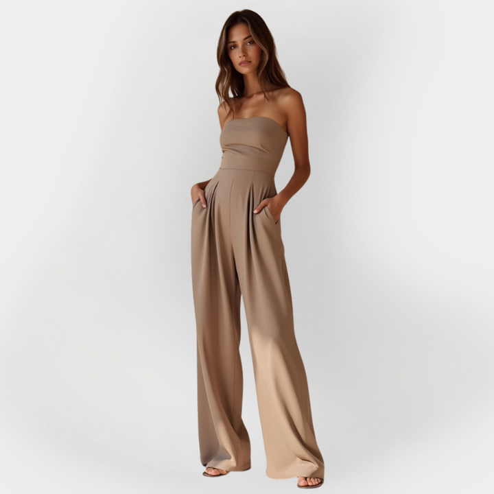 "Salopetă" can be rewritten as "Overall" or "Jumpsuit." If you're looking for a more descriptive title, you could use "Stylish Jumpsuit" or "Chic Overall." Please let me know if you have a specific context or style in mind!