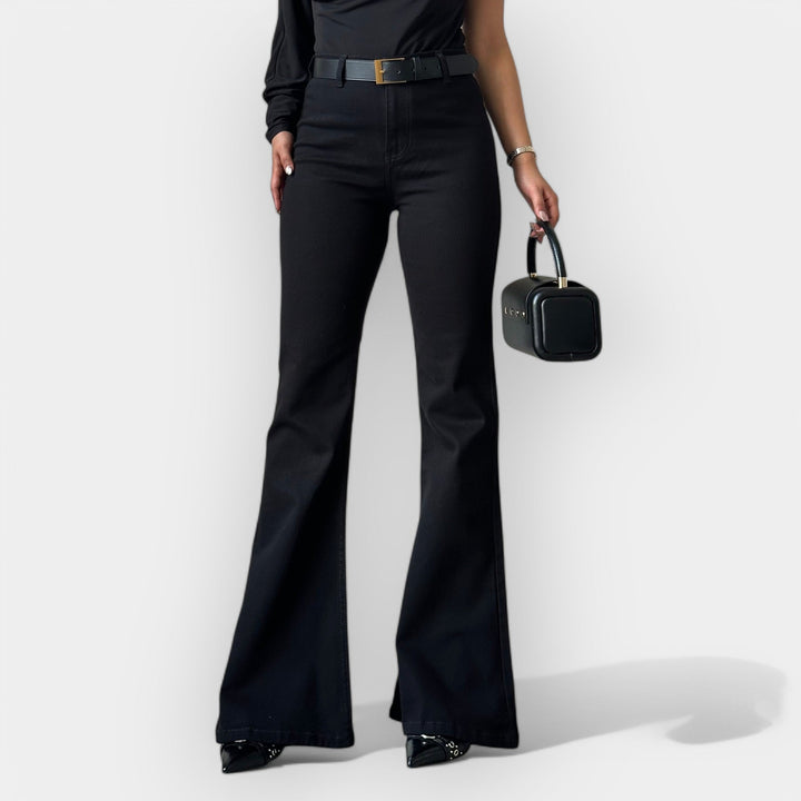 "Jeans Flare cu Talie Înaltă" can be rewritten as "Jeans Flare cu Talie Înaltă pentru Un Look Elegant".